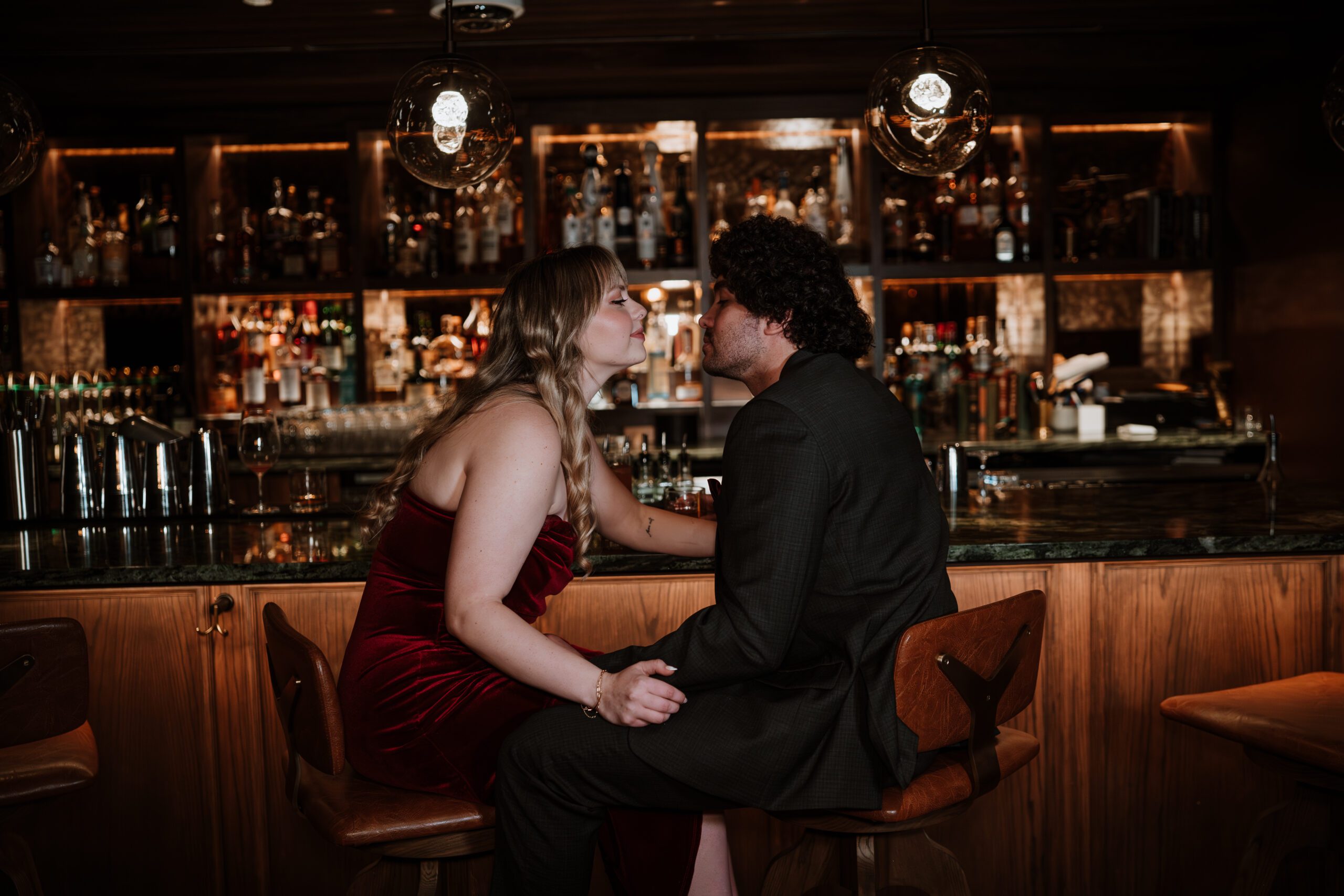 Engagement photos at The Canary, a speakeasy in Hotel Alpenrock.